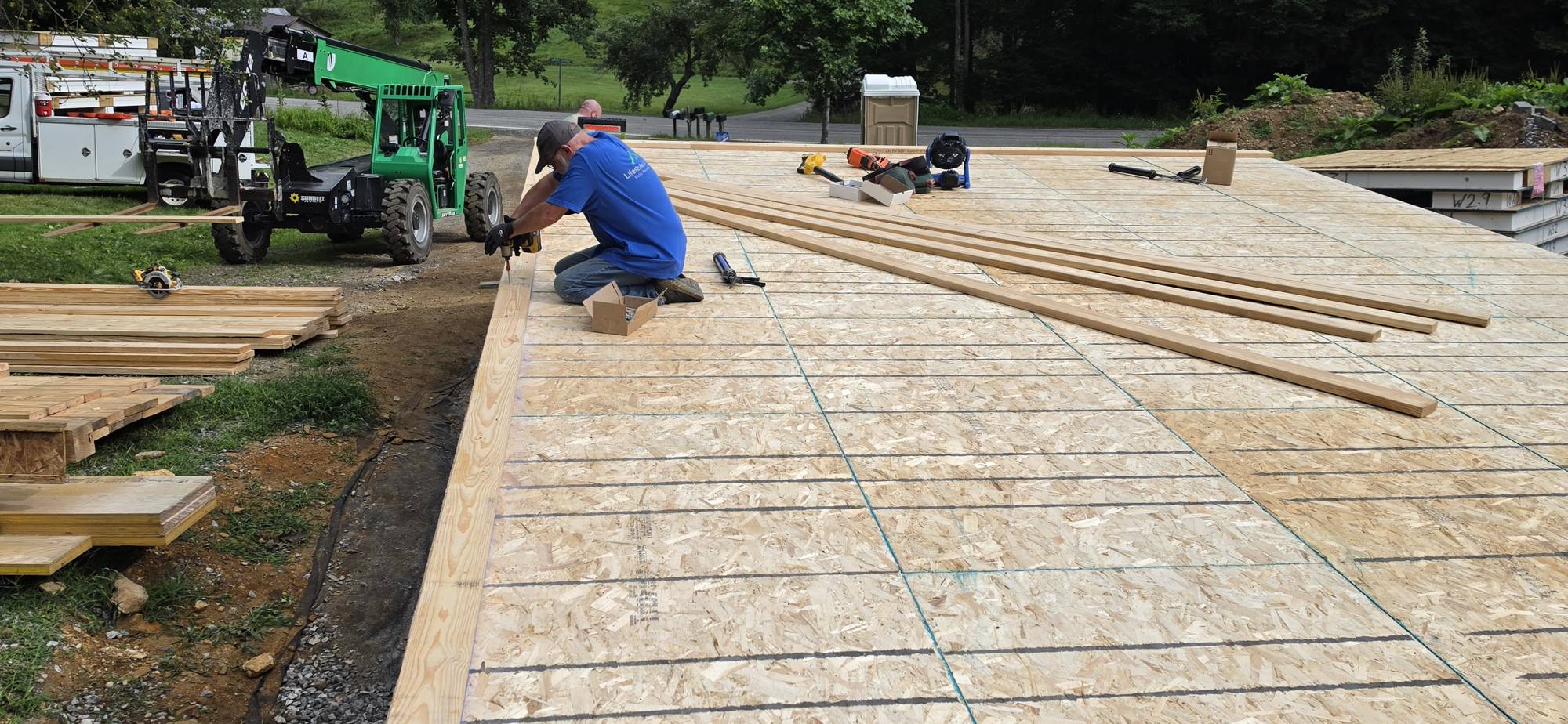 Subfloor sheathing laid over the floor framing