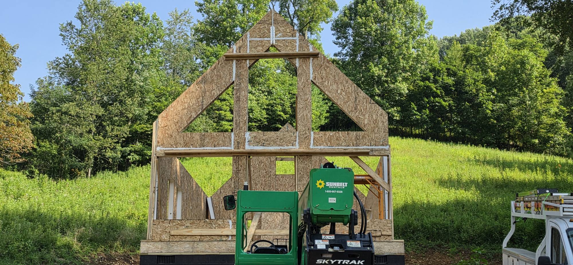 Glazed gable wall framed in SIP panels